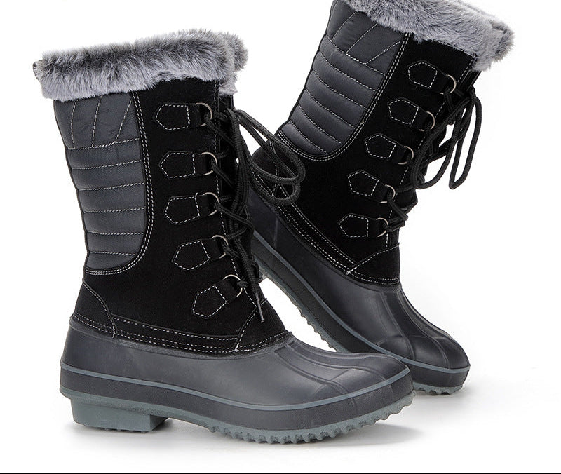 Black lace-up mid-calf snow boots with faux fur cuff and textured rubber tread