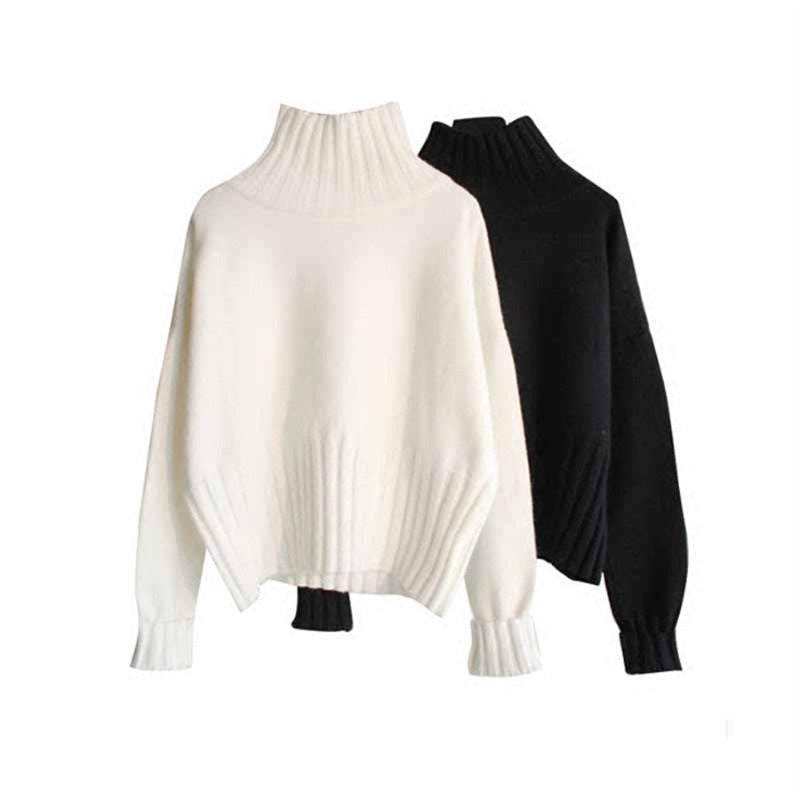 Oversized ribbed turtleneck knit sweater in white and black with balloon sleeves