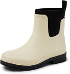 Ivory Chelsea ankle rain boot with elastic gore and black lugged rubber sole