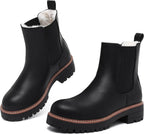 Black faux leather Chelsea ankle boots with faux fur lining, contrast welt and chunky lug soles