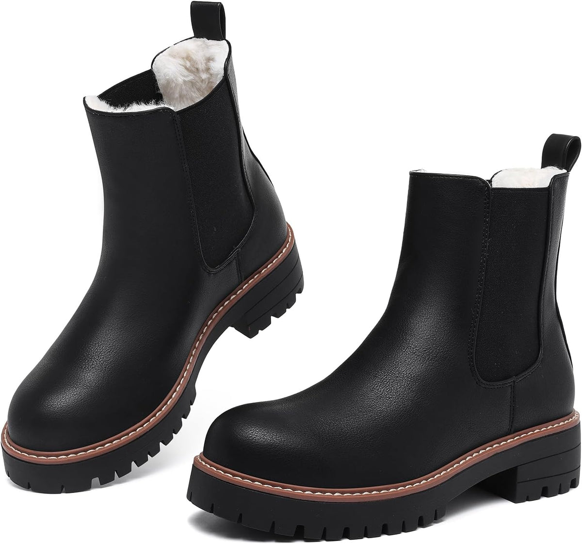 Black faux leather Chelsea ankle boots with faux fur lining, contrast welt and chunky lug soles