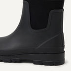 Black Chelsea ankle rain boot with elastic gore and treaded rubber sole