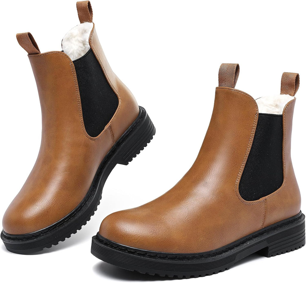 Brown faux fur lined Chelsea ankle boots with black elastic gussets and lug soles