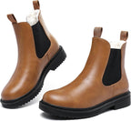 Brown faux fur lined Chelsea ankle boots with black elastic gussets and lug soles
