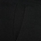 Women's black fleece sweatpants fabric and seam detail