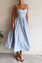 Light blue sweetheart midi dress with spaghetti straps and gathered flared skirt