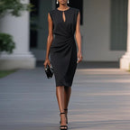 Black sleeveless sheath midi dress with keyhole cutout and ruched waist detail