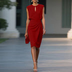 Deep red sleeveless sheath midi dress with keyhole cutout and ruched waist twist