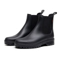 Women's black chelsea rain boots, elastic gore panels, thick lug rubber sole