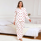 Women’s heart-print pajama set, white long-sleeve button top and matching pants with red hearts