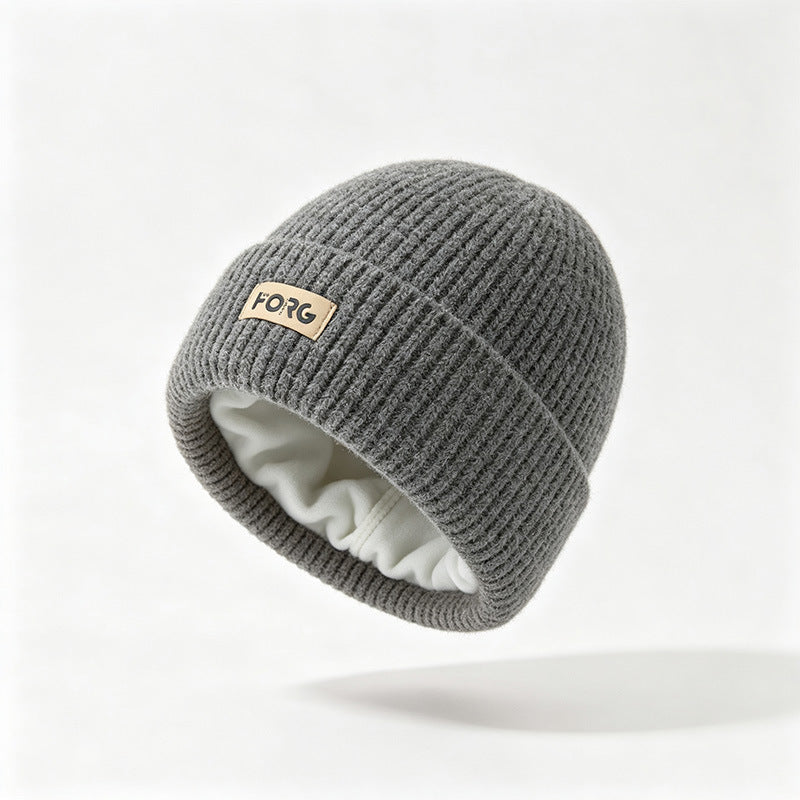 Gray ribbed knit beanie with fleece lining and FORG patch