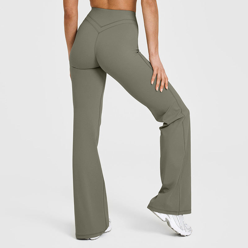 Women’s high-waisted crossover flare leggings in olive green, wide bootcut pant legs