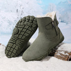 Olive green mid-calf snow boots with buckled strap, plush collar, and patterned tread sole