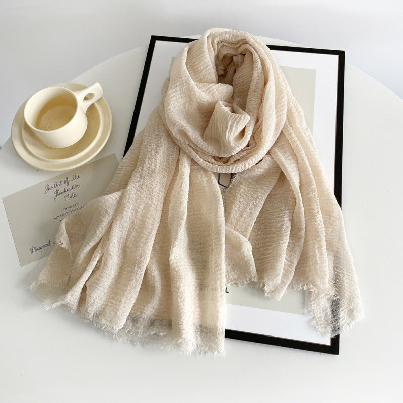 Women’s cotton scarf in cream, long crinkle gauze with frayed fringe ends