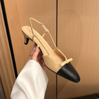 Two-tone slingback kitten heel pump with cap toe and buckle ankle strap