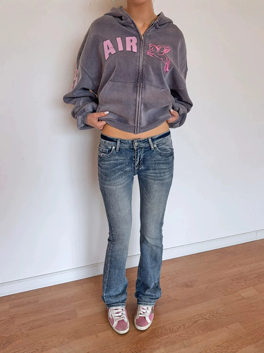 Gray cropped zip-up hoodie with pink AIR graphic and appliqué patches