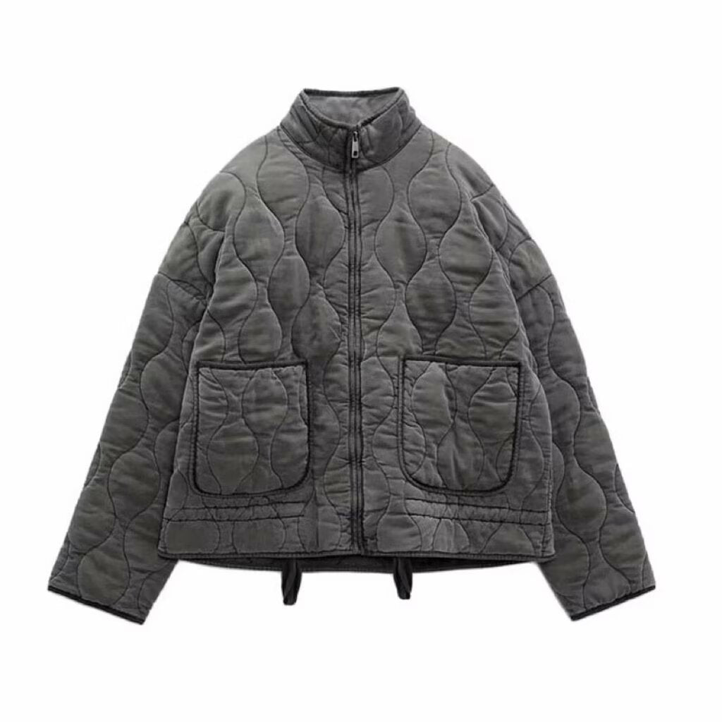 Gray quilted stand-collar zip-up jacket with long sleeves and two flap chest pockets.