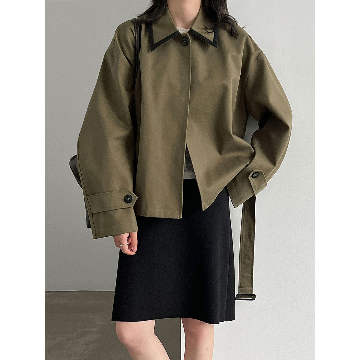 Cropped belted trench jacket in olive green with contrast collar and flap pockets