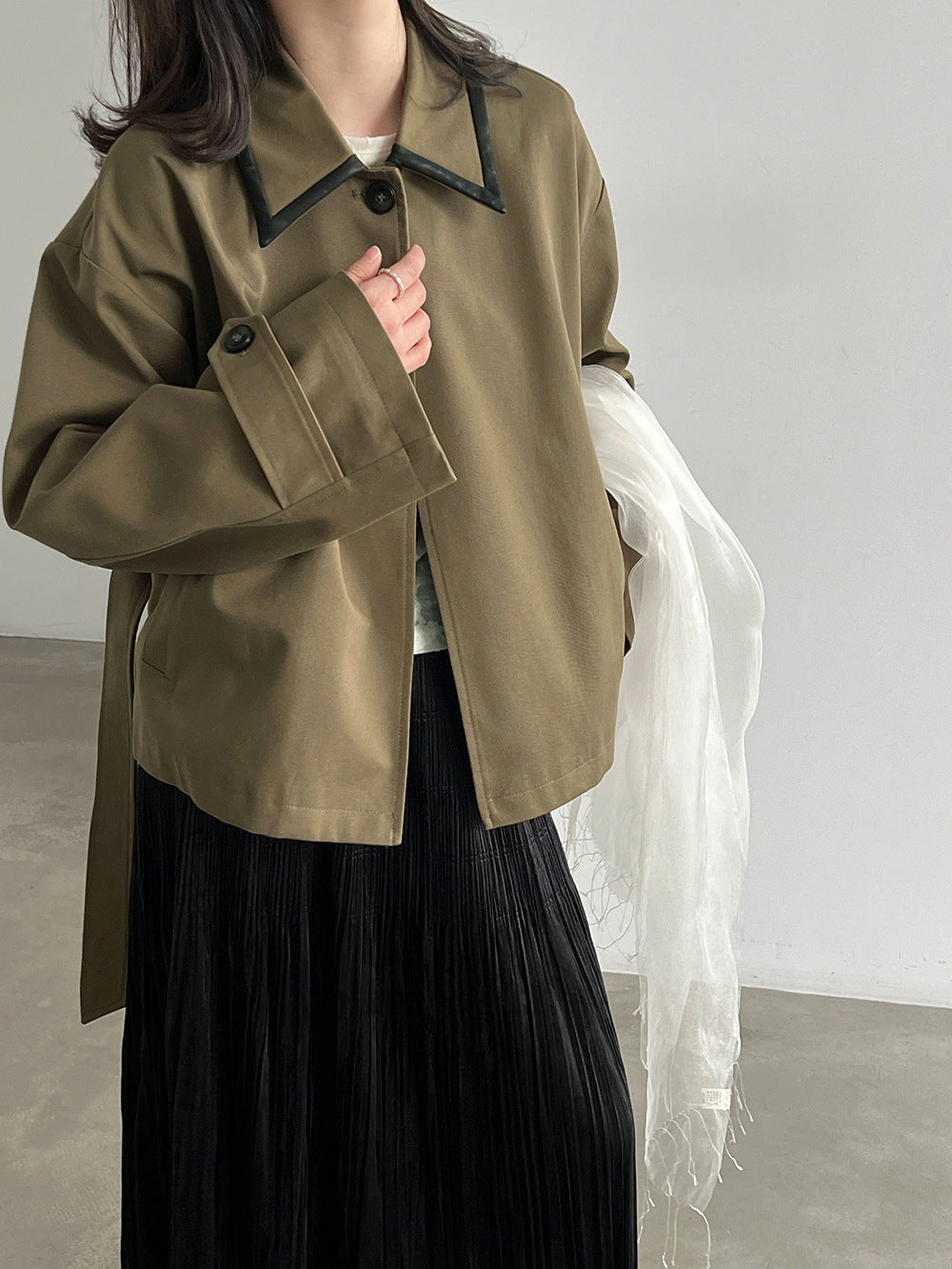 Cropped belted trench jacket in olive green with contrast collar and buttoned cuffs