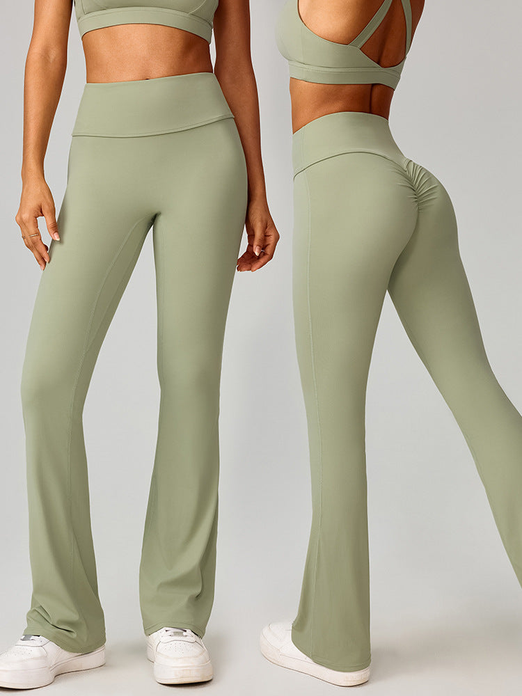 Sage green high-waisted flare leggings, front view with straight-to-bootcut leg openings.