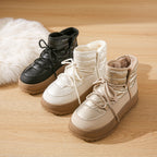 Fleece-lined lace-up winter snow boots in black and off-white with padded collars
