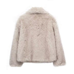 Light beige cropped faux fur jacket with long sleeves and stand collar.