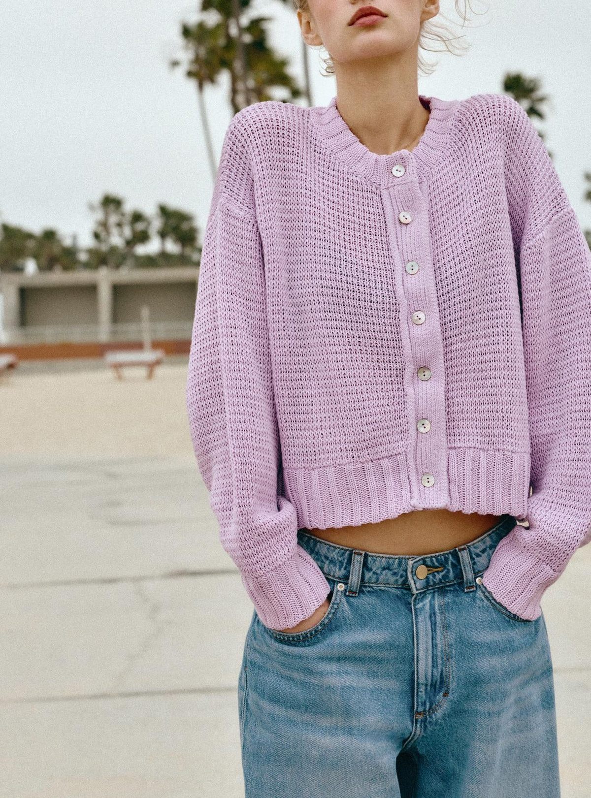 Light purple cropped open-knit cardigan with button front, long sleeves, ribbed hem and cuffs