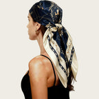 Navy satin head scarf with gold print, large square wrap tied at the side