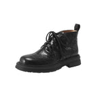 Women’s black lace-up ankle boots with round toe and chunky lug sole