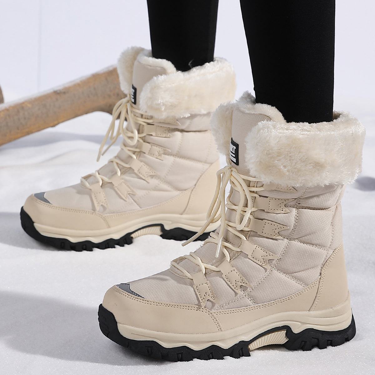 Cream beige mid-calf snow boots with faux-fur lining, lace-up front, and lug sole