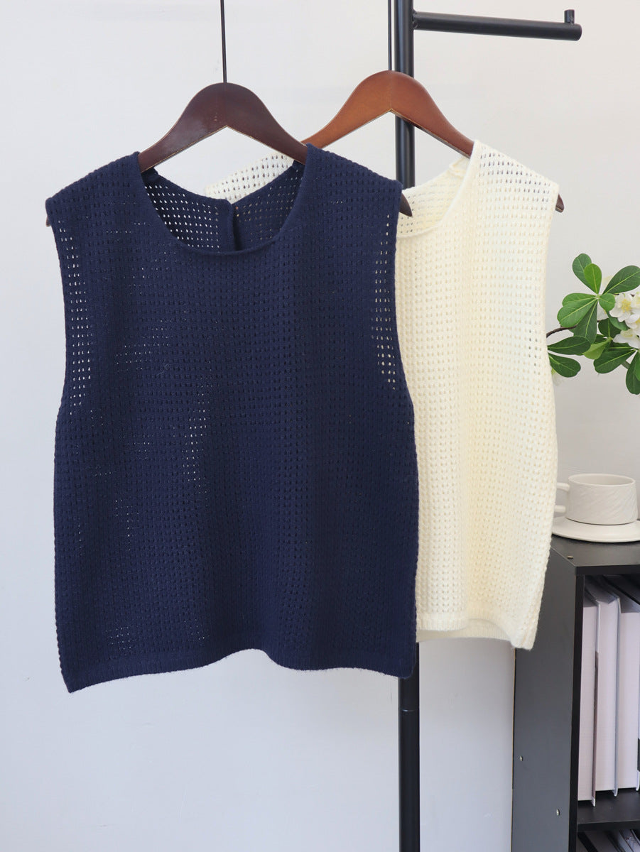 Hollow-out lightweight knit sleeveless vest on hangers, navy and off-white