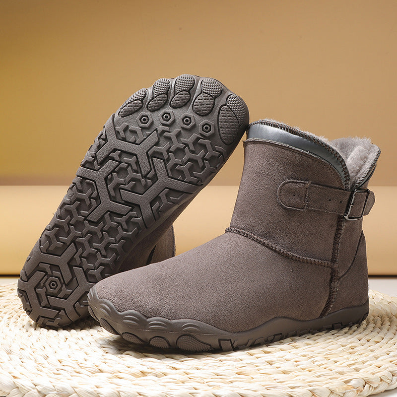 Women's winter boots in gray, side buckle strap, faux fur collar, grippy tread sole.