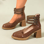 Brown croc-embossed platform ankle strap pumps with block heels and triple buckle cuff