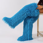 Bright blue shaggy thigh-high boots with long fur fibers