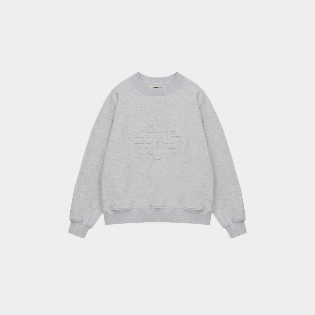 Gray women’s crewneck sweatshirt with embossed geometric logo on the chest