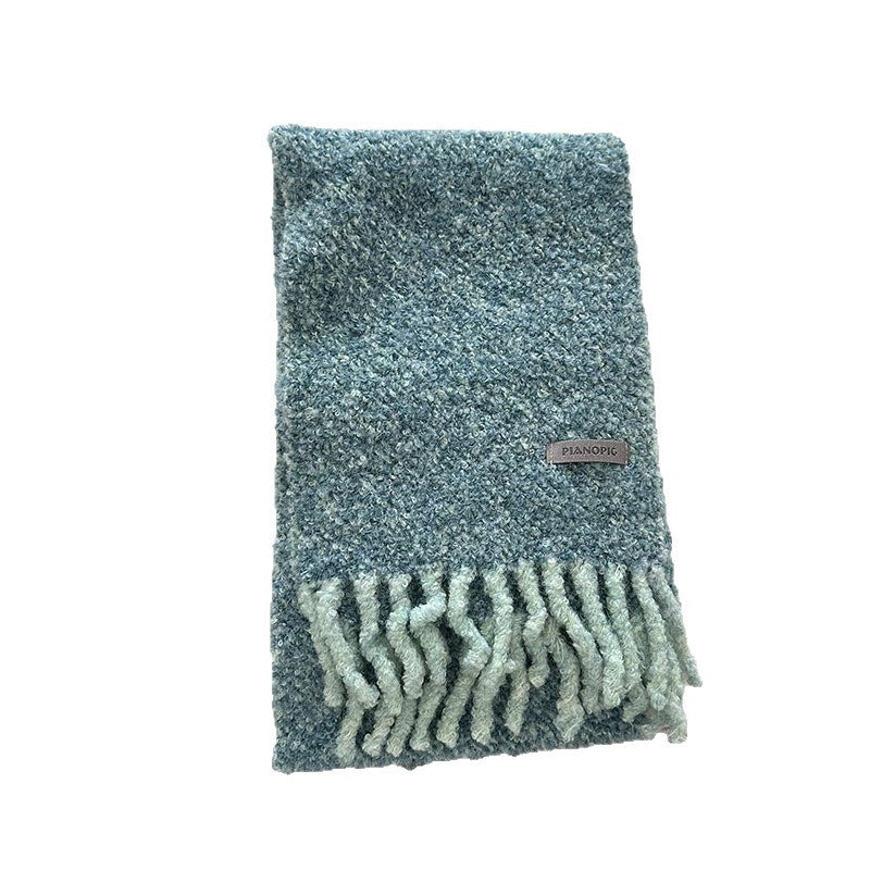Boucle knit scarf, turquoise with long fringe tassels and small logo patch