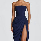 Strapless ruched navy maxi dress with draped wrap skirt and high slit, sleeveless formal gown