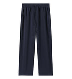 Women’s navy blue wide-leg sweatpants with drawstring waistband and side pockets