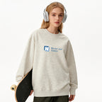 Light gray crewneck sweatshirt with N logo graphic, long sleeves, relaxed fit.