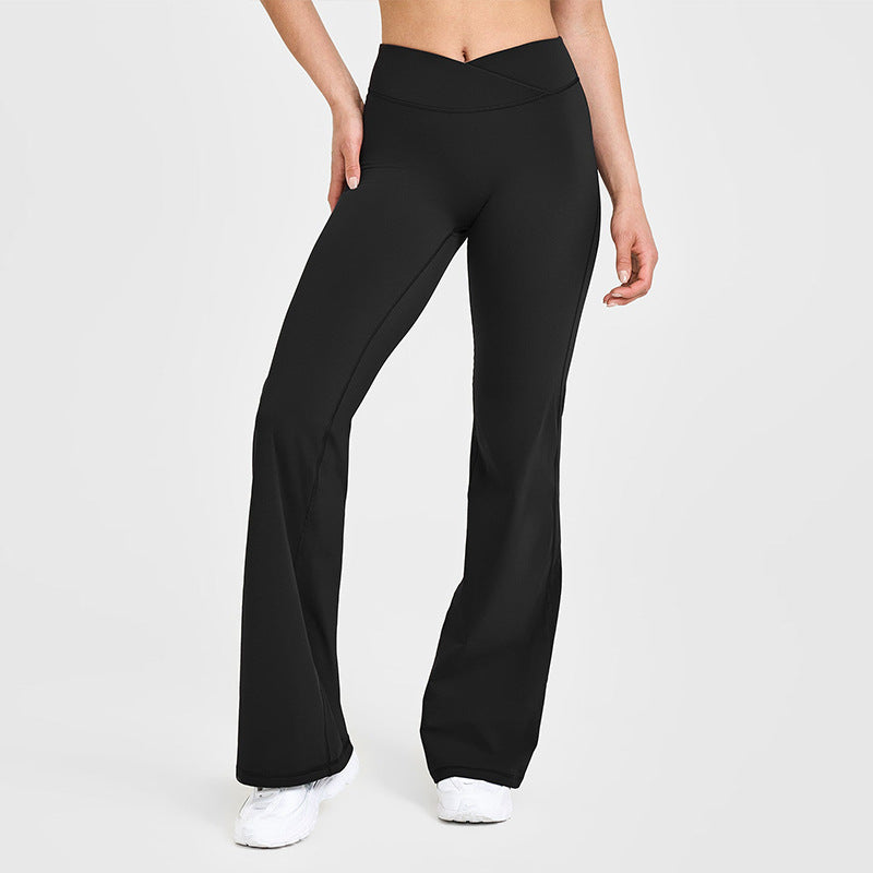 High-waisted crossover flare leggings, black, V-shaped waist detail