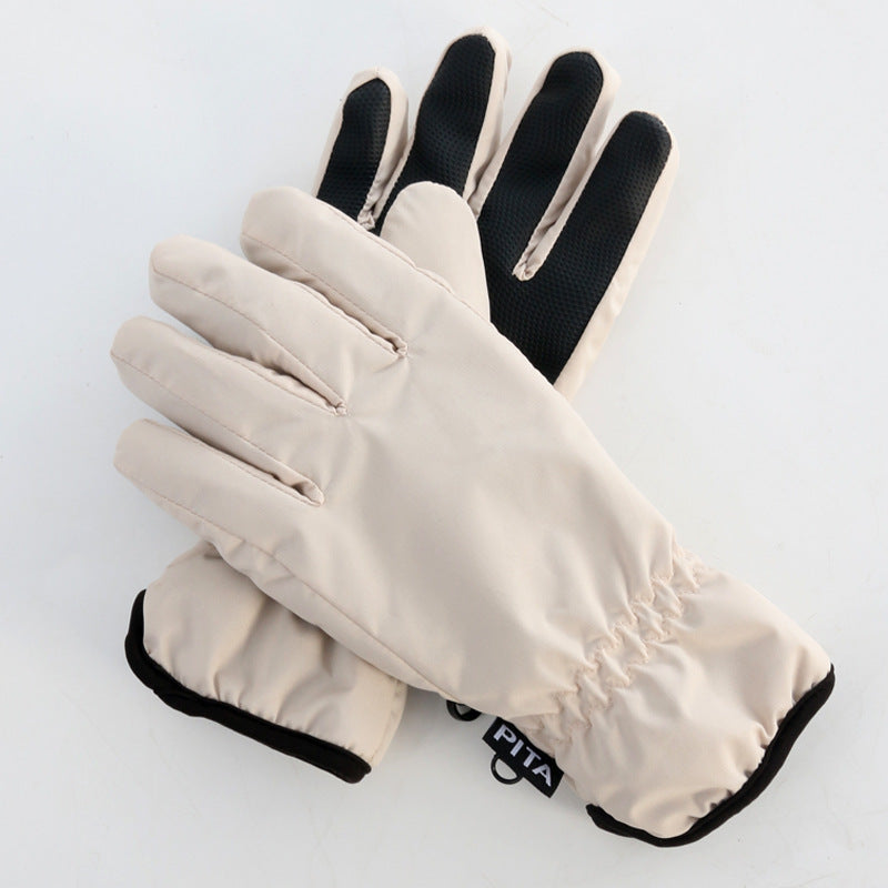 Cream insulated ski gloves with black-trimmed wrist and padded palms