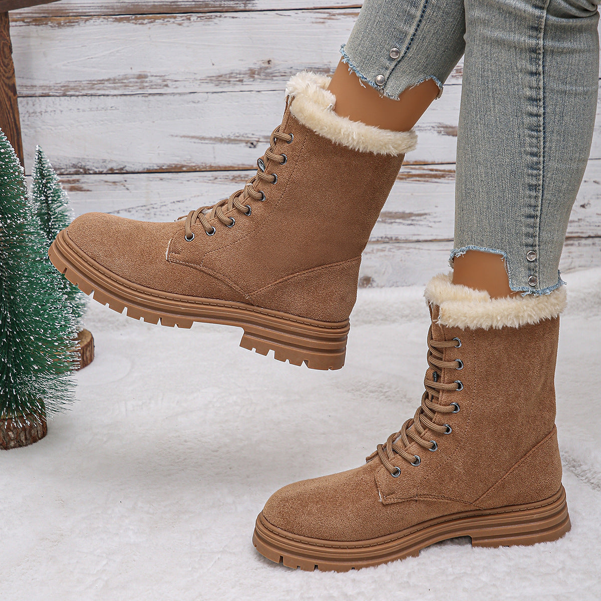 Camel faux suede snow boots with faux fur cuff, lace-up front, and lug tread sole