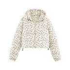 Cropped hooded puffer jacket in cream with polka dot print, front zipper, elastic cuffs.