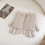 Women’s beige fingerless knit gloves with ribbed cuffs and textured wave pattern