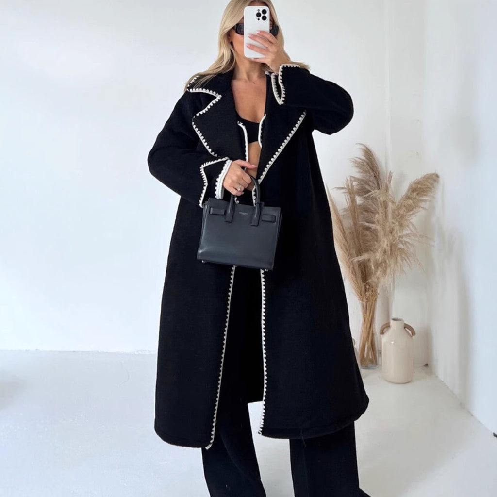 Black long open-front wool coat with contrast stitched trim, oversized fit