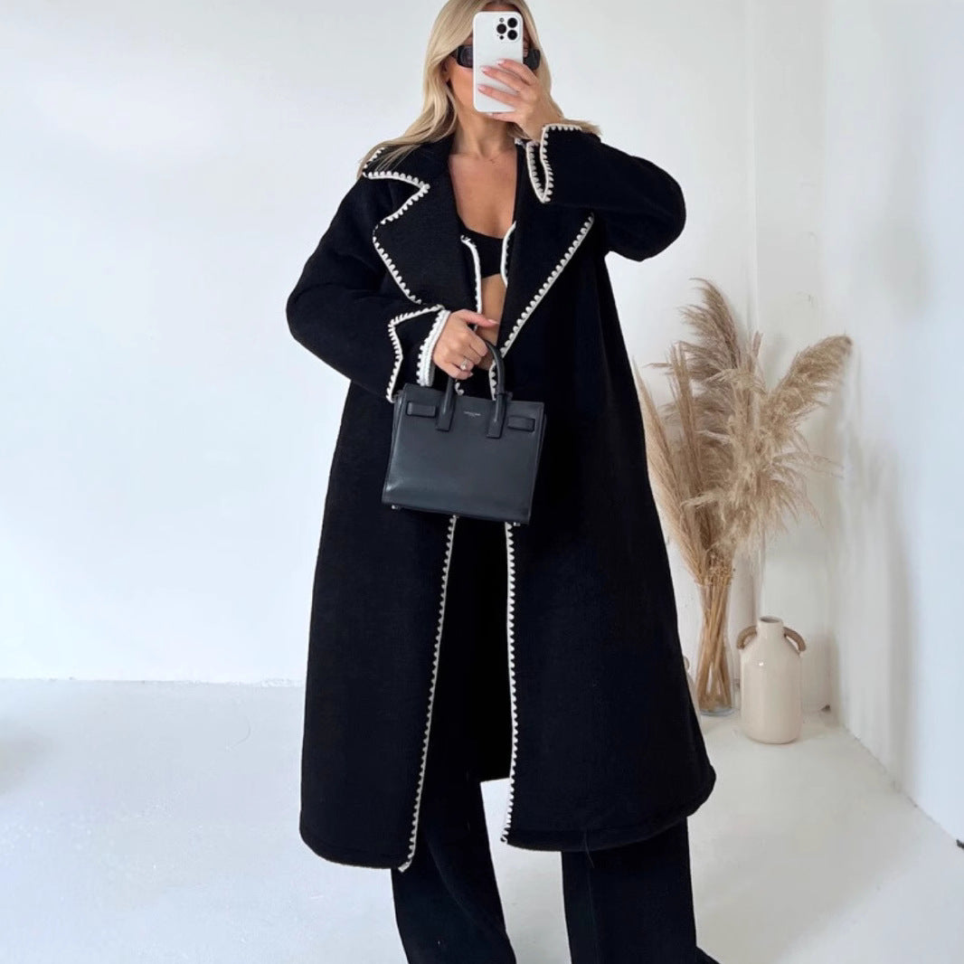 Black long open-front wool coat with contrast stitched trim, oversized fit
