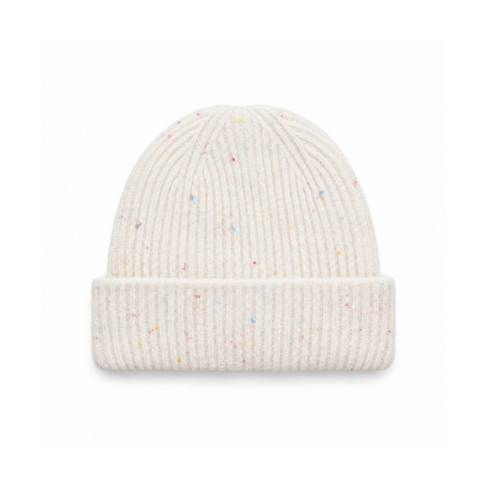 Speckled rib-knit beanie in off-white with a wide folded cuff.