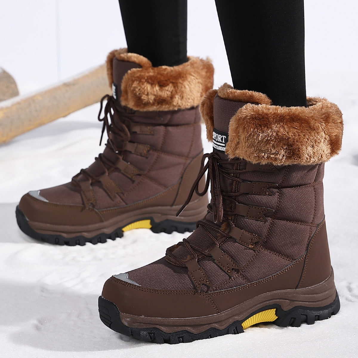 Brown mid-calf winter boots with faux-fur cuff, lace-up closure, and rugged lug outsole