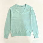 Women’s mint green V-neck fine-knit sweater with long sleeves and ribbed cuffs