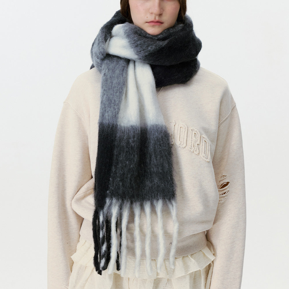 Oversized plaid scarf in dark gray and light gray with long fringed trim